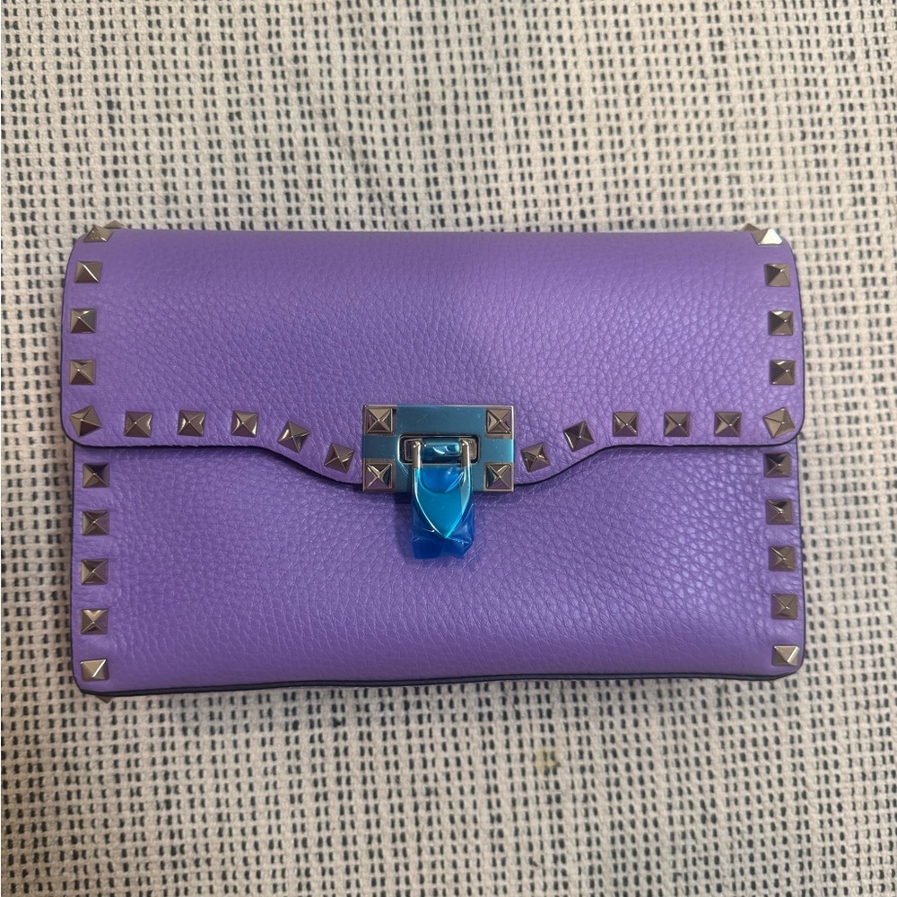 Beautiful Valentino clutch / crossbody in a unique tone of deep purple.